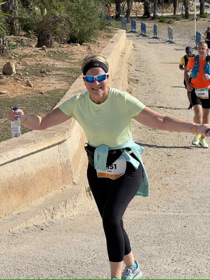 Sigga á hlaupum í hálfmaraþoni.